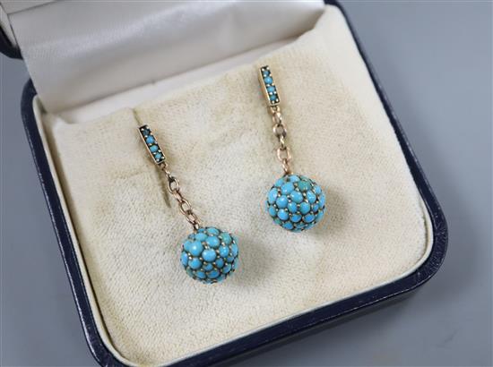 A pair of early 20th century 9ct and turquoise encrusted spherical drop earrings, 32mm.